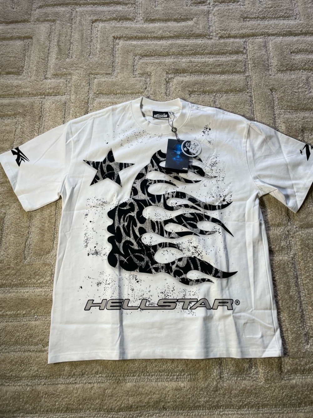 Hellstar Men’s White Short-Sleeve Graphic Tee with Black Flame Star